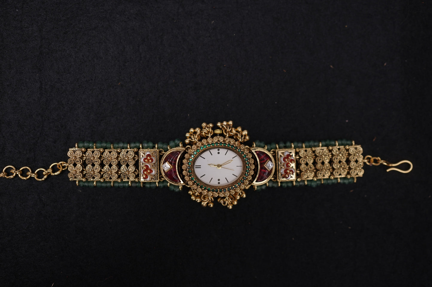 Red & Green Meenakari work watch.